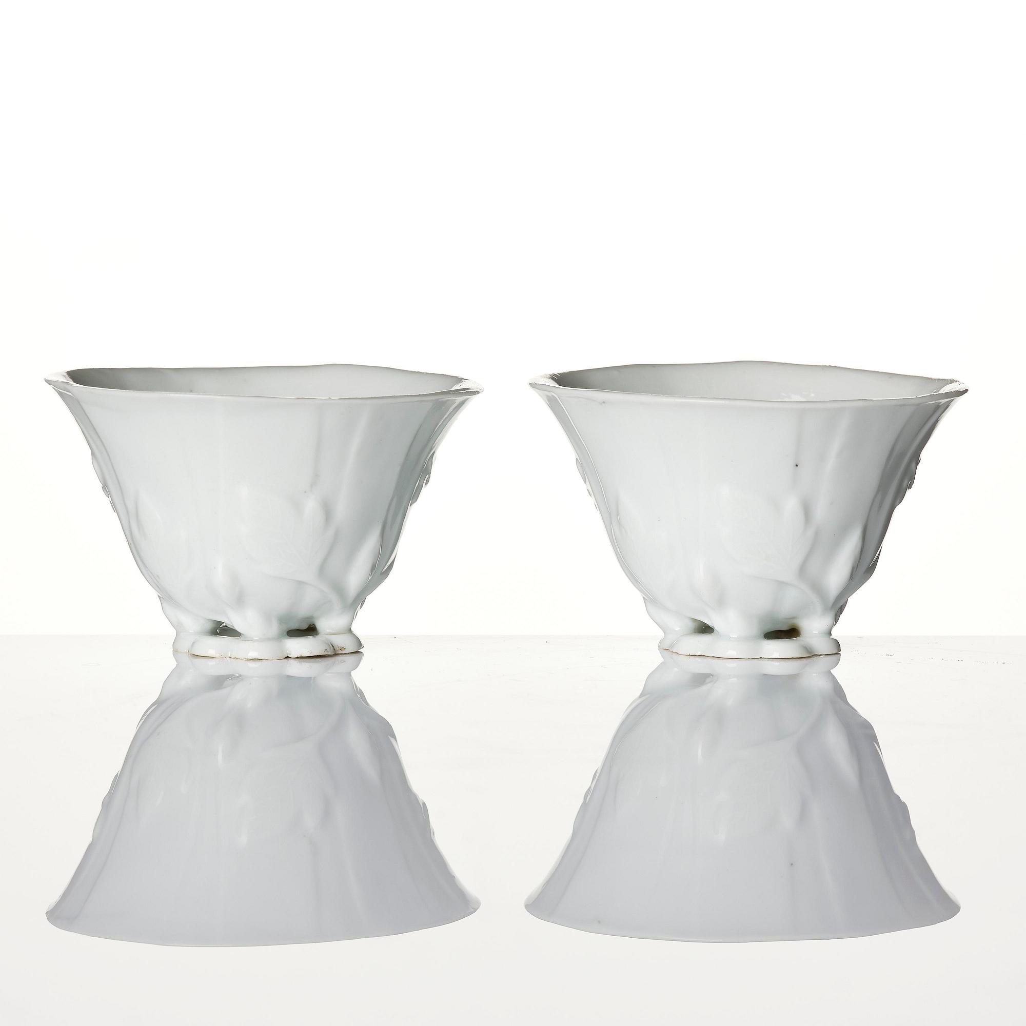 A pair of blanc de chine libation cups, Qing dynasty, 19th century.