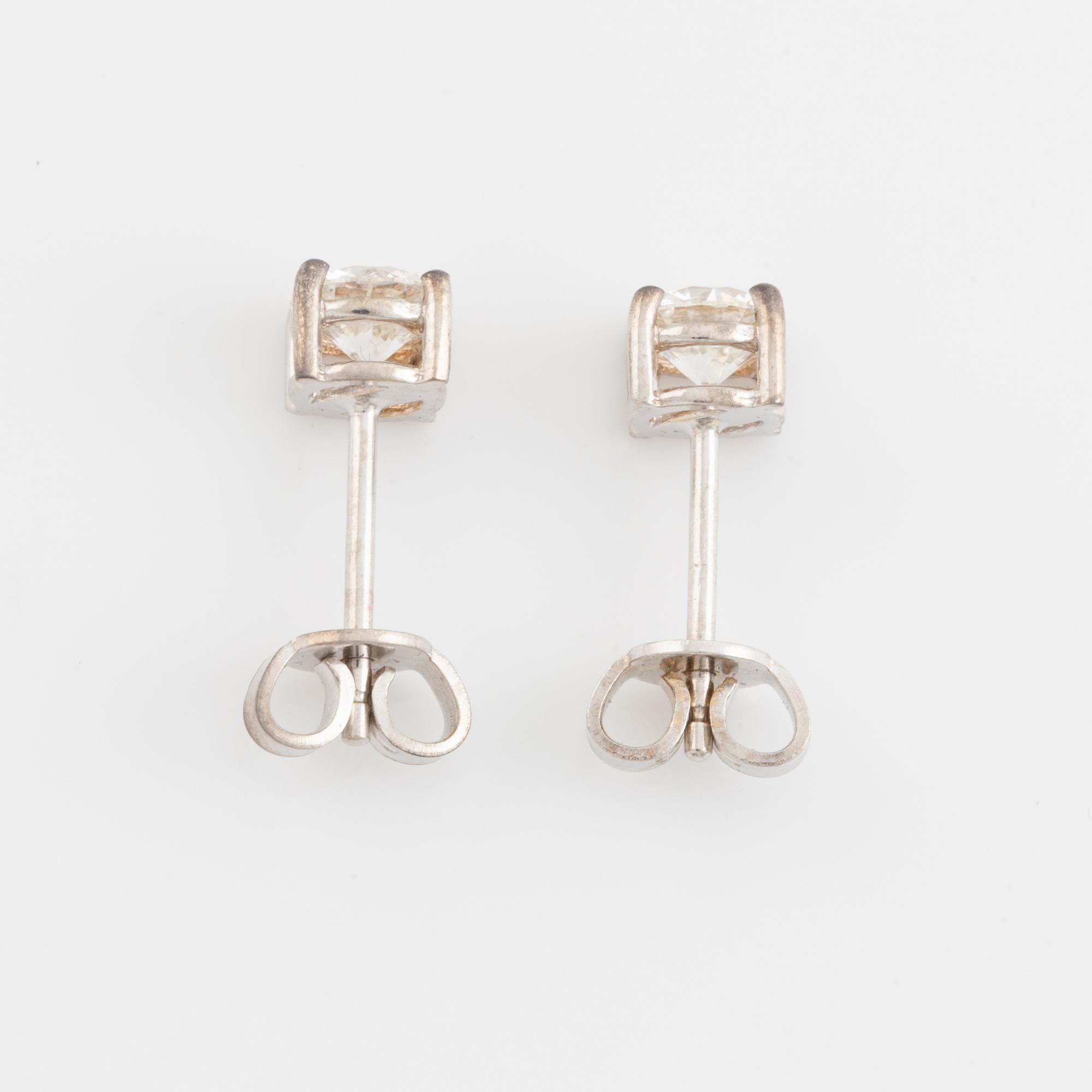 Brilliant cut diamond stud earrings, with IGI report.