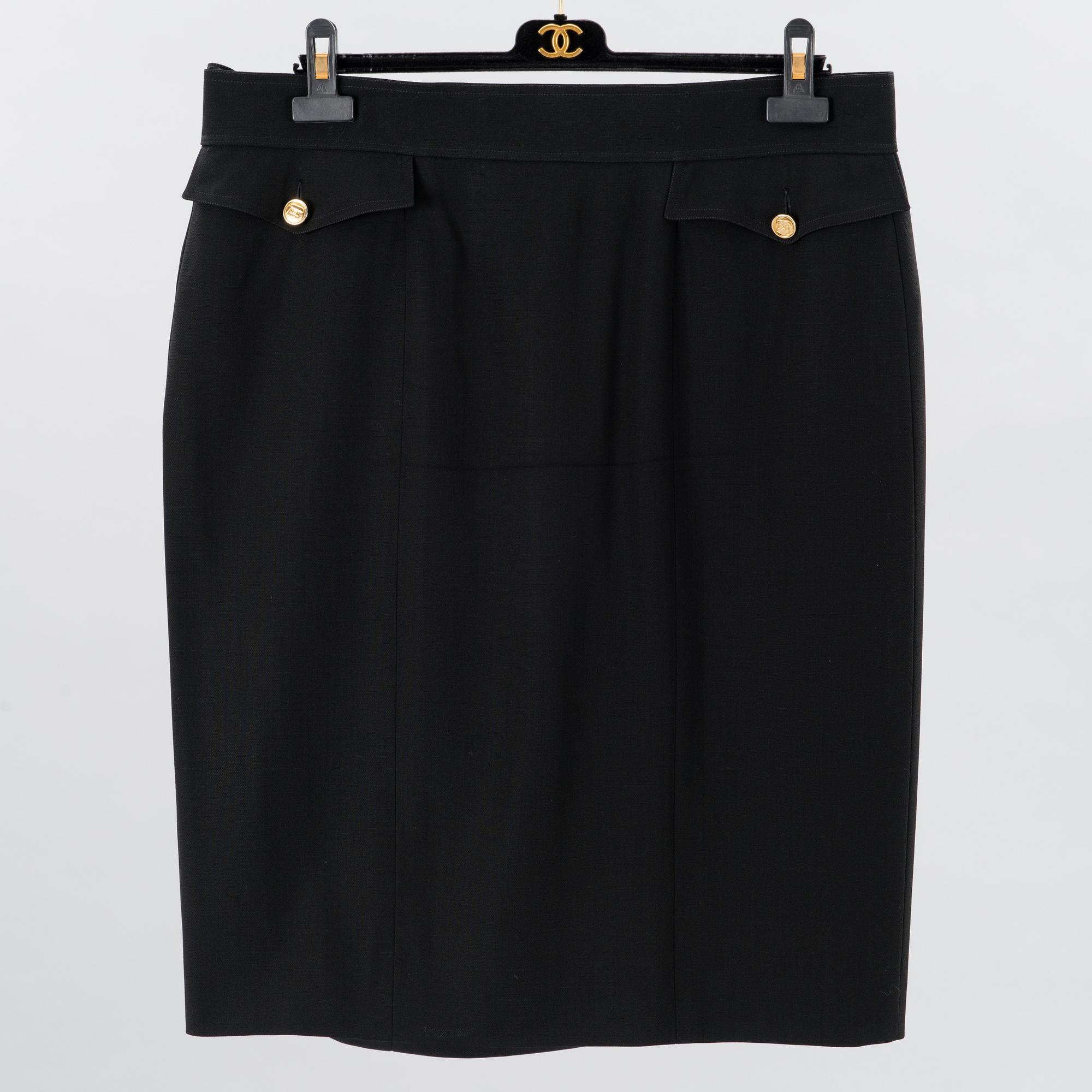 SKIRT AND A PAIR OF TROUSERS.