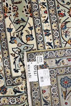 A Kashan carpet, c. 400 x 290 cm.