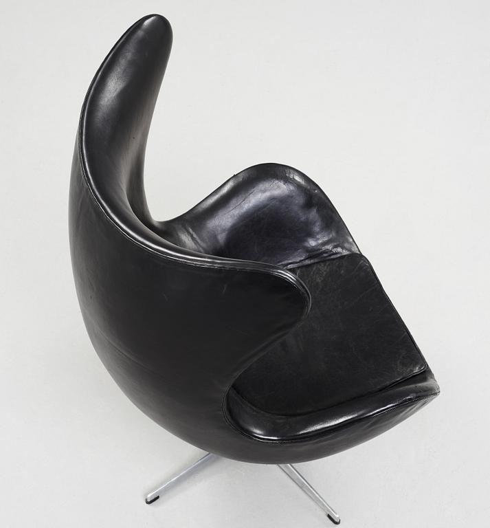 An Arne Jacobsen black leather 'Egg' chair, Fritz Hansen, Denmark 1960's.
