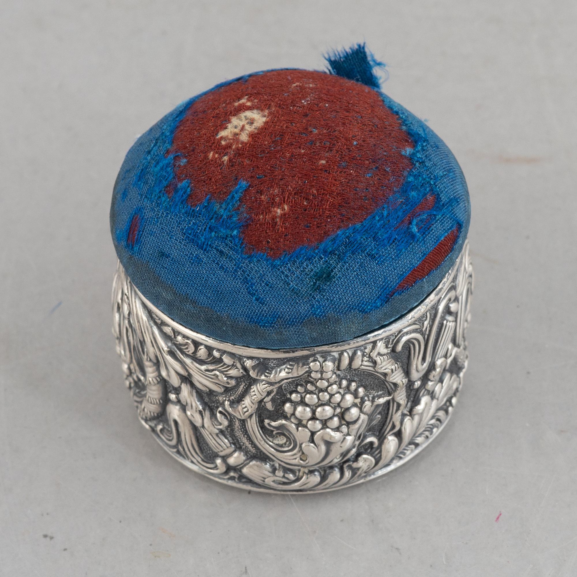 Tiffany & Co, a silver plated box with pin cushion lid.