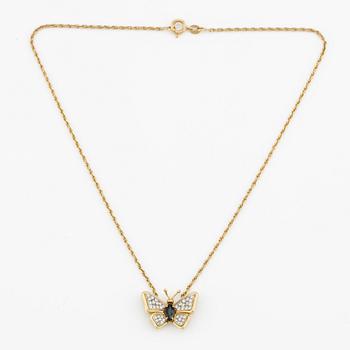 Necklace, butterfly, 18K gold with blue sapphire and brilliant-cut diamonds.