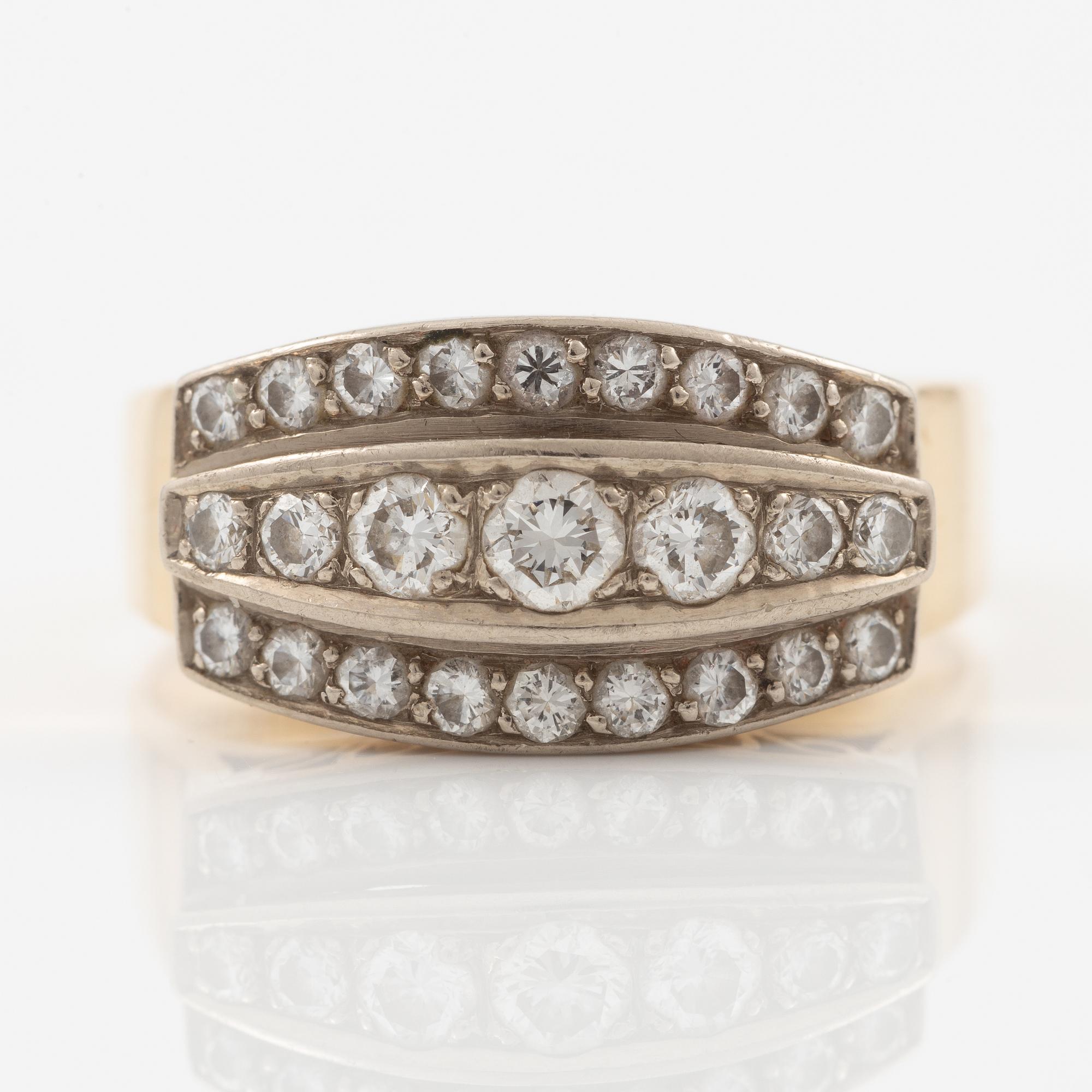 Ring in 18K gold set with round brilliant-cut diamonds, Stigbert.