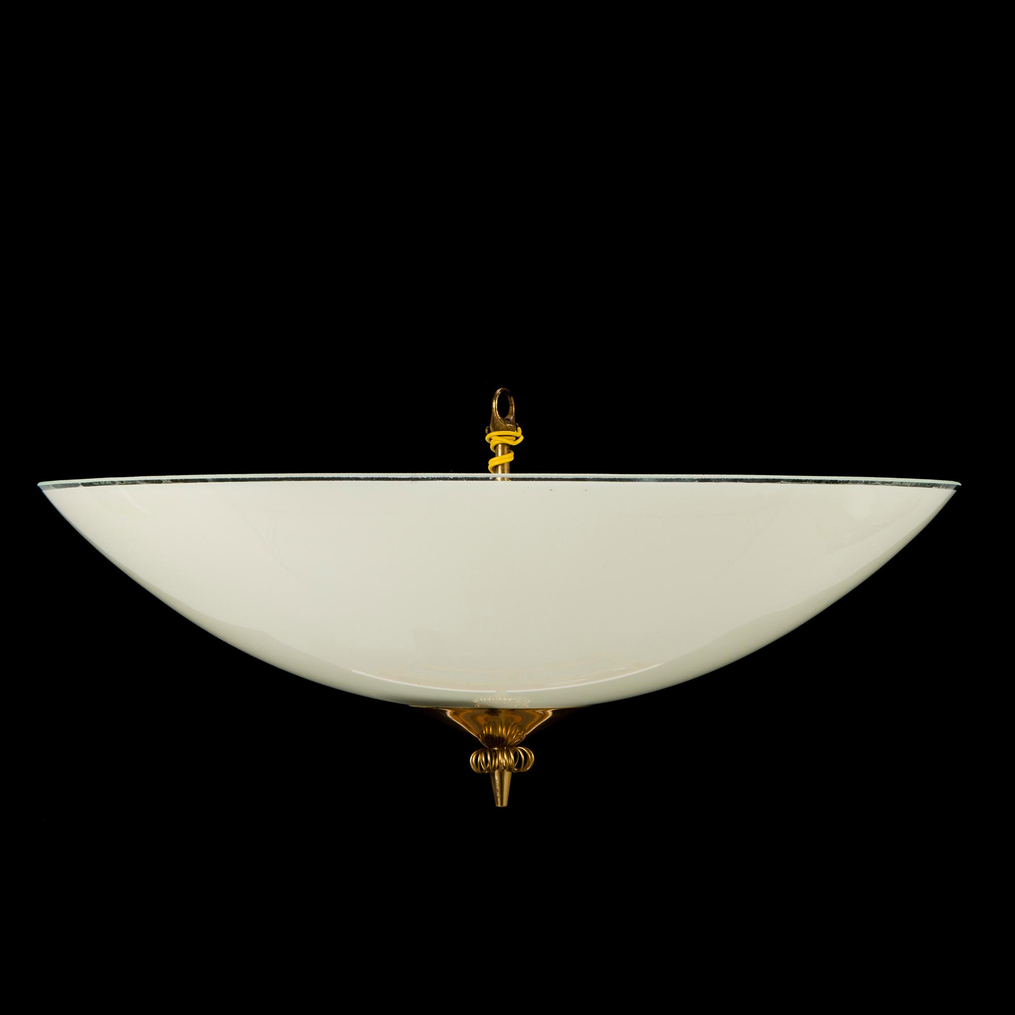 A mid-20th century ceiling light for Itsu Finland.