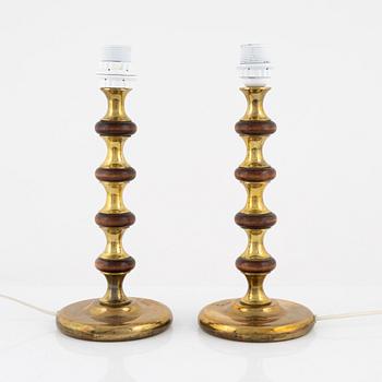 A pair of brass and wood table lights, Ivars Armatur, Sweden 1960-70s.