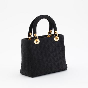 CHRISTIAN DIOR, a black silk blend handbag, "Lady Dior".