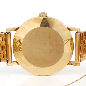 ARMBANDSUR, 18k guld, Longines ca vikt 78,3 gram.