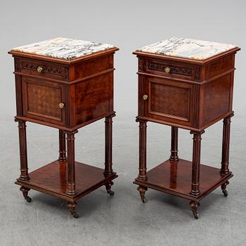 A pair of eclectic 20th century bedside tables.