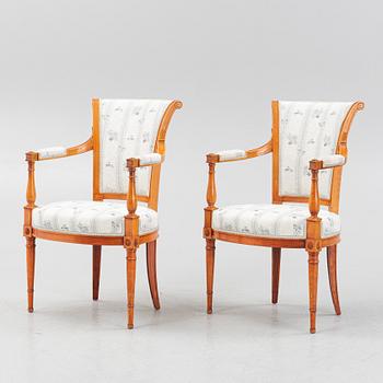 A pair of Louis XVI-style open armchairs, 20th century.