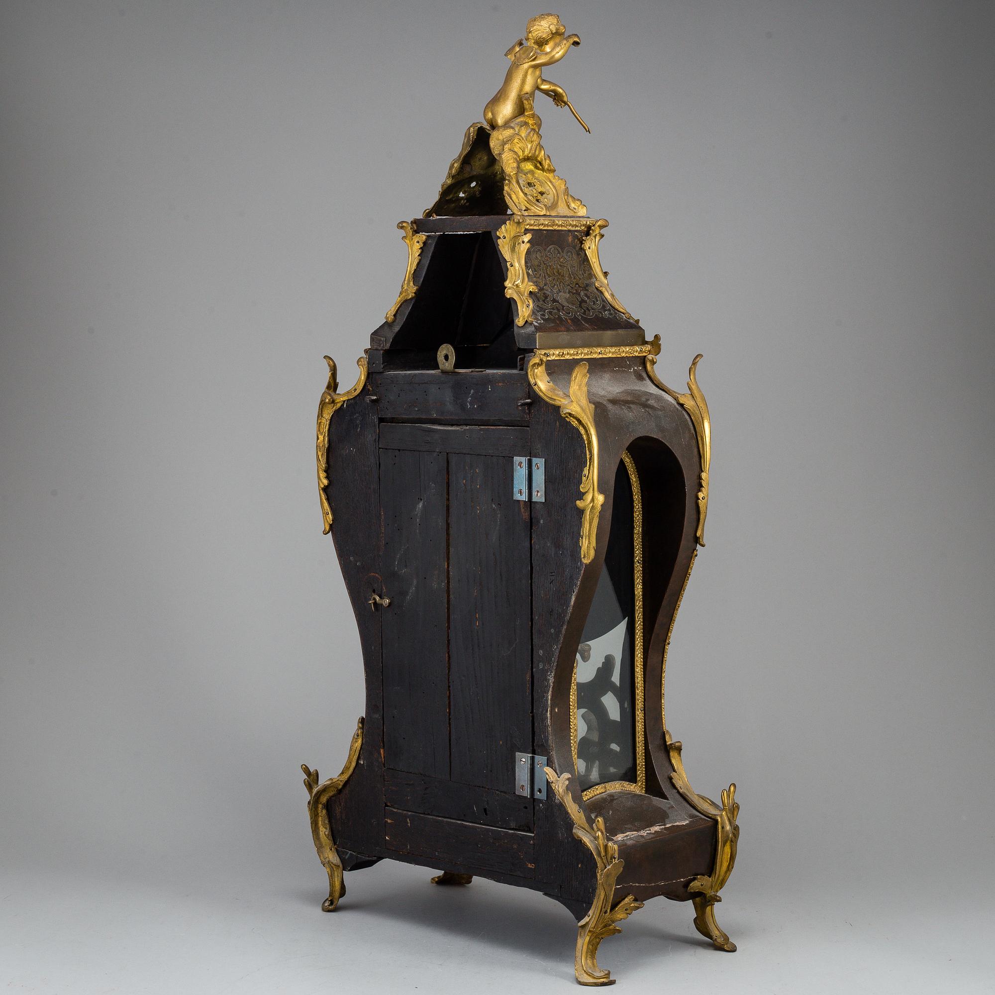 A French Louis XV pendulum clock, signed Lefaucheur fils a Paris.