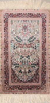 Oriental silk rug, approximately 121x77 cm.