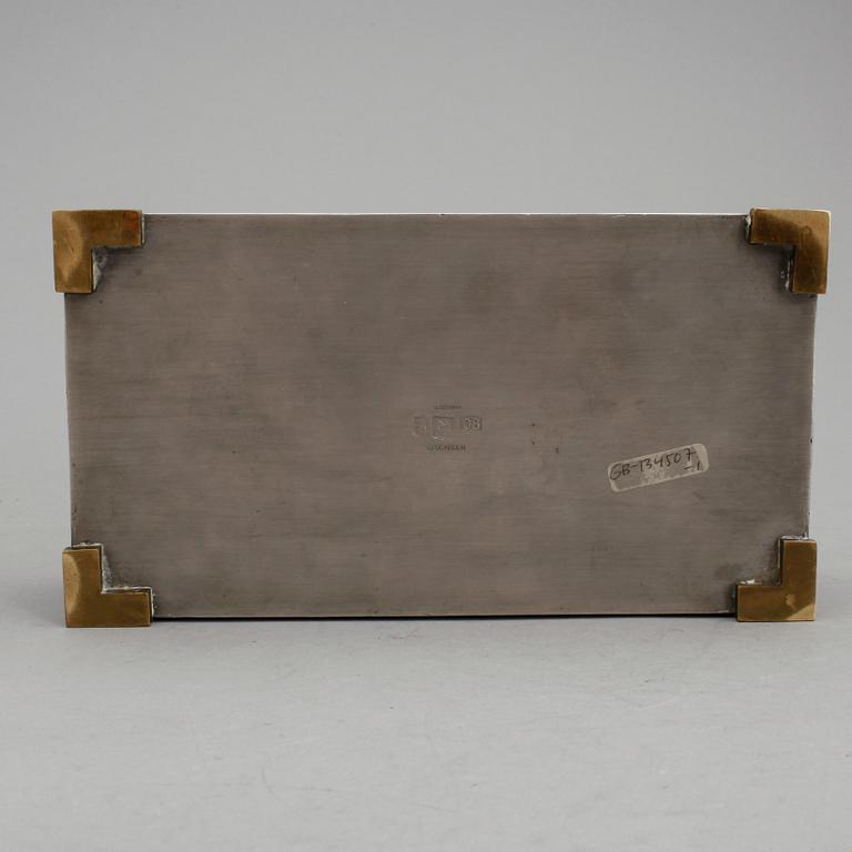 SKRIN, tenn och mässing, Herman Bergmans Konstgjuteri, Stockholm, 1940.