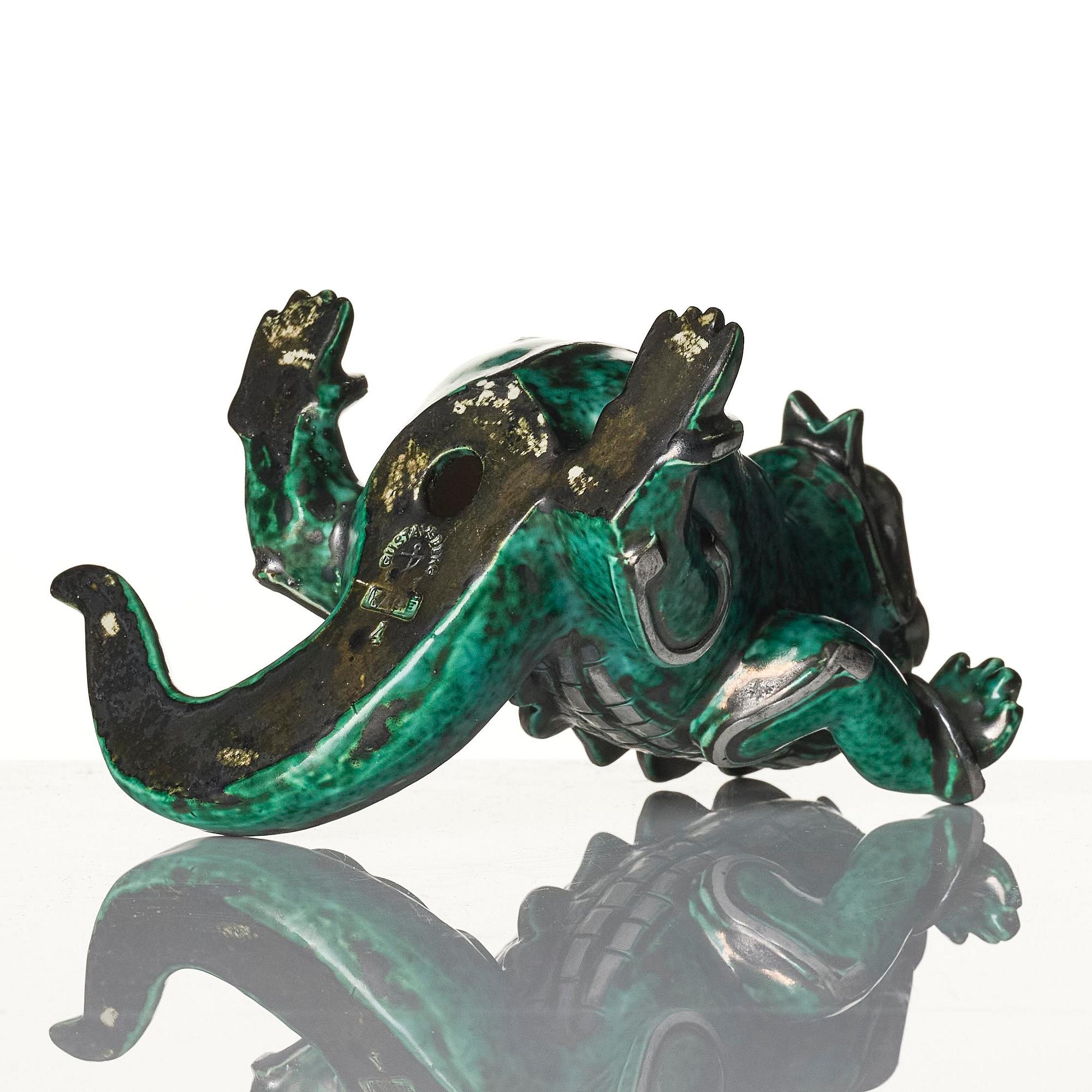 Wilhelm Kåge, an "Argenta" stoneware sculpture of a dragon puppy, Gustavsberg, 1940s.
