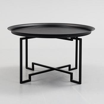 A coffee table designed in 2000 by Per Öberg for Svensk Tenn.