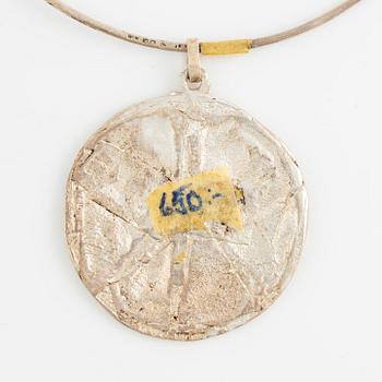 Lars Arby, three neck rings with pendants, silver, Gothenburg including 1977, 1978, and 1982.