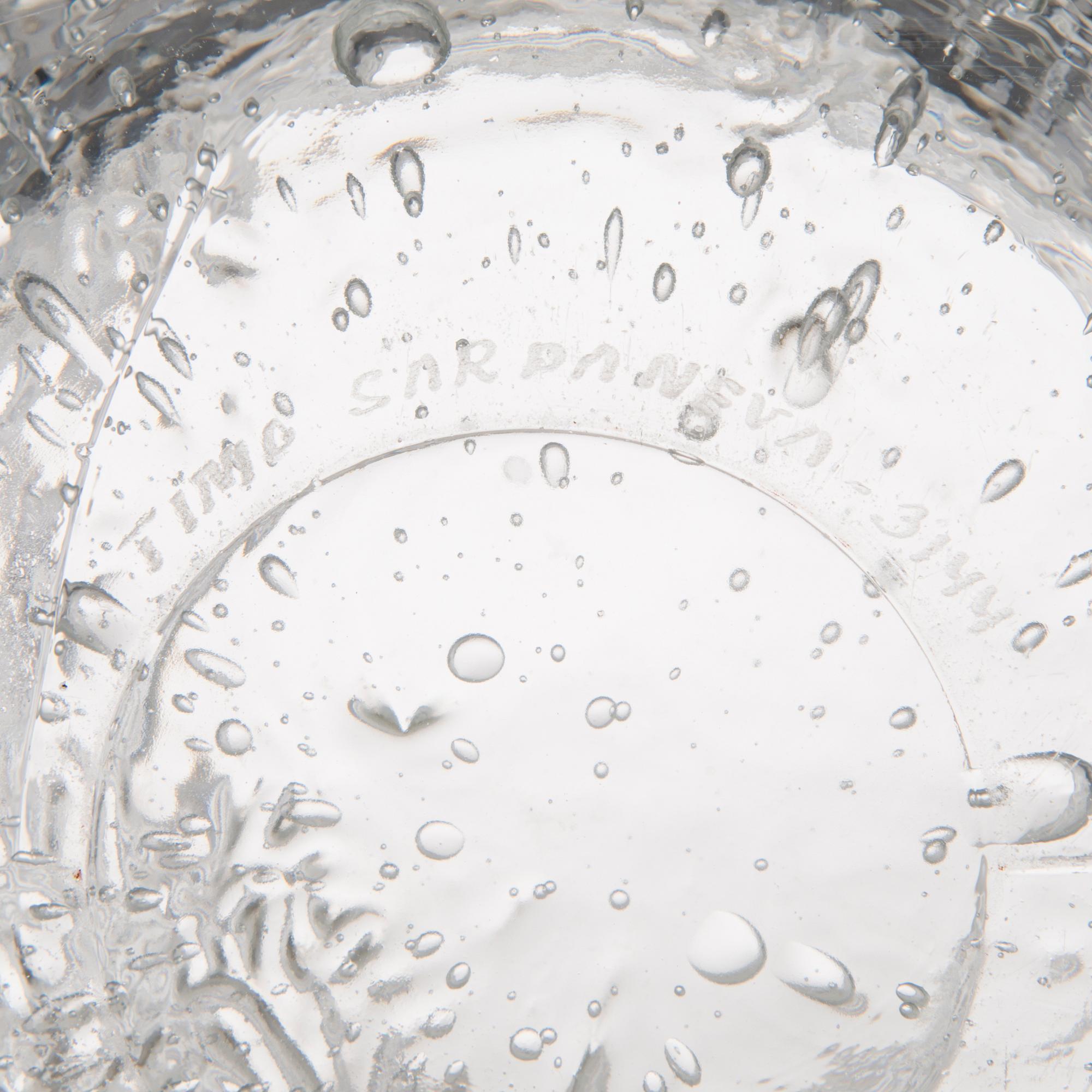 A glass vase of the 'Arkipelago' series for Iittala, signed Timo Sarpaneva - 3144. Iittala.