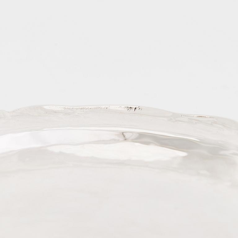 A 12-piece set of sterling silver dishes / coasters, Peru 1950s-60s.