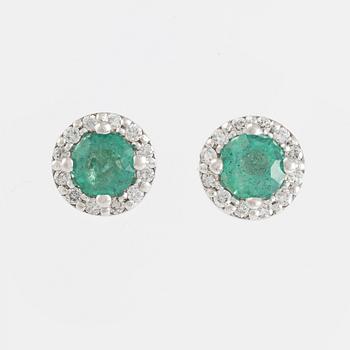 Emerald and brilliant cut diamond earrings.