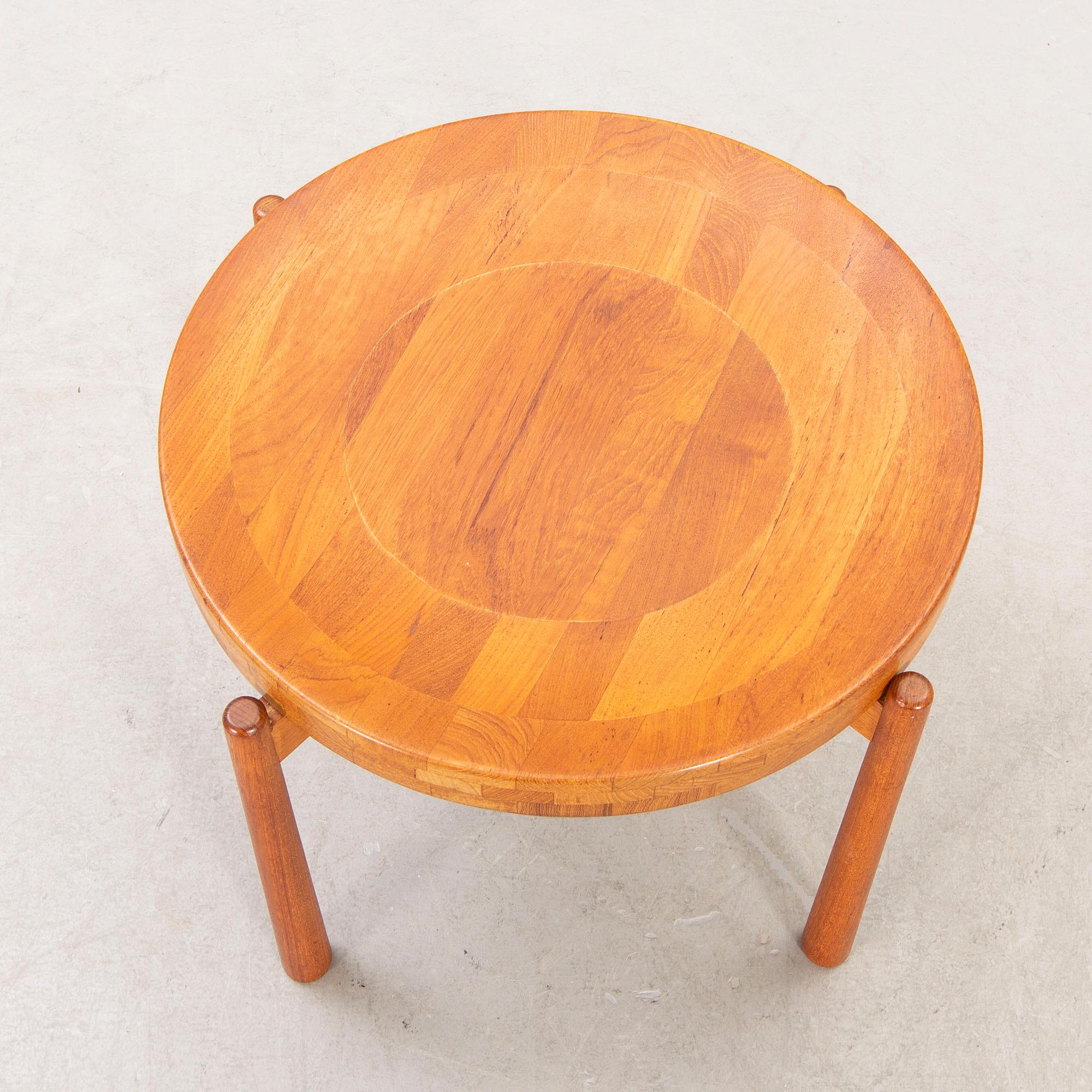 A Jens Quistgaard teak table mind 1900s.