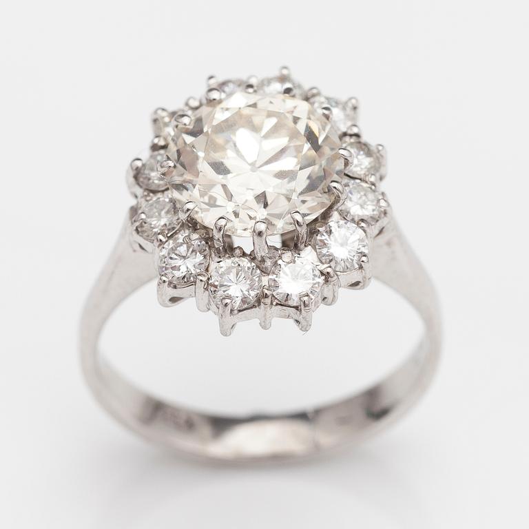 An 18K white gold ring with an old cut diamonds and brilliant cut diamonds ca. 3.68 cts in total. Hallmarked HEG.