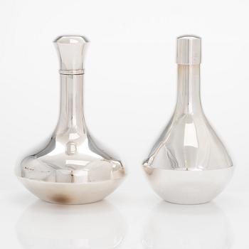 Pekka Piekäinen, two silver carafes, 1979 and 1990, Auran Kultaseppä and Tarkiainen, Finland.