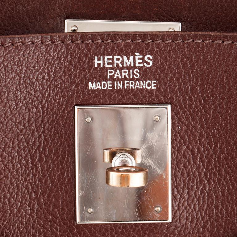 HERMÈS, a brown leather handbag, "Kelly 35".