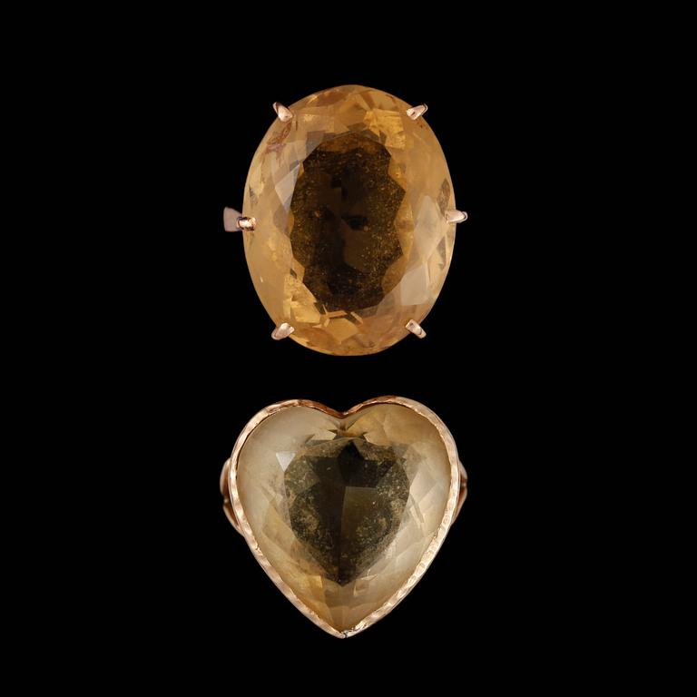 RINGAR, 2 st, guld 14 k, facettslipade citriner. Tot vikt ca 16 g.