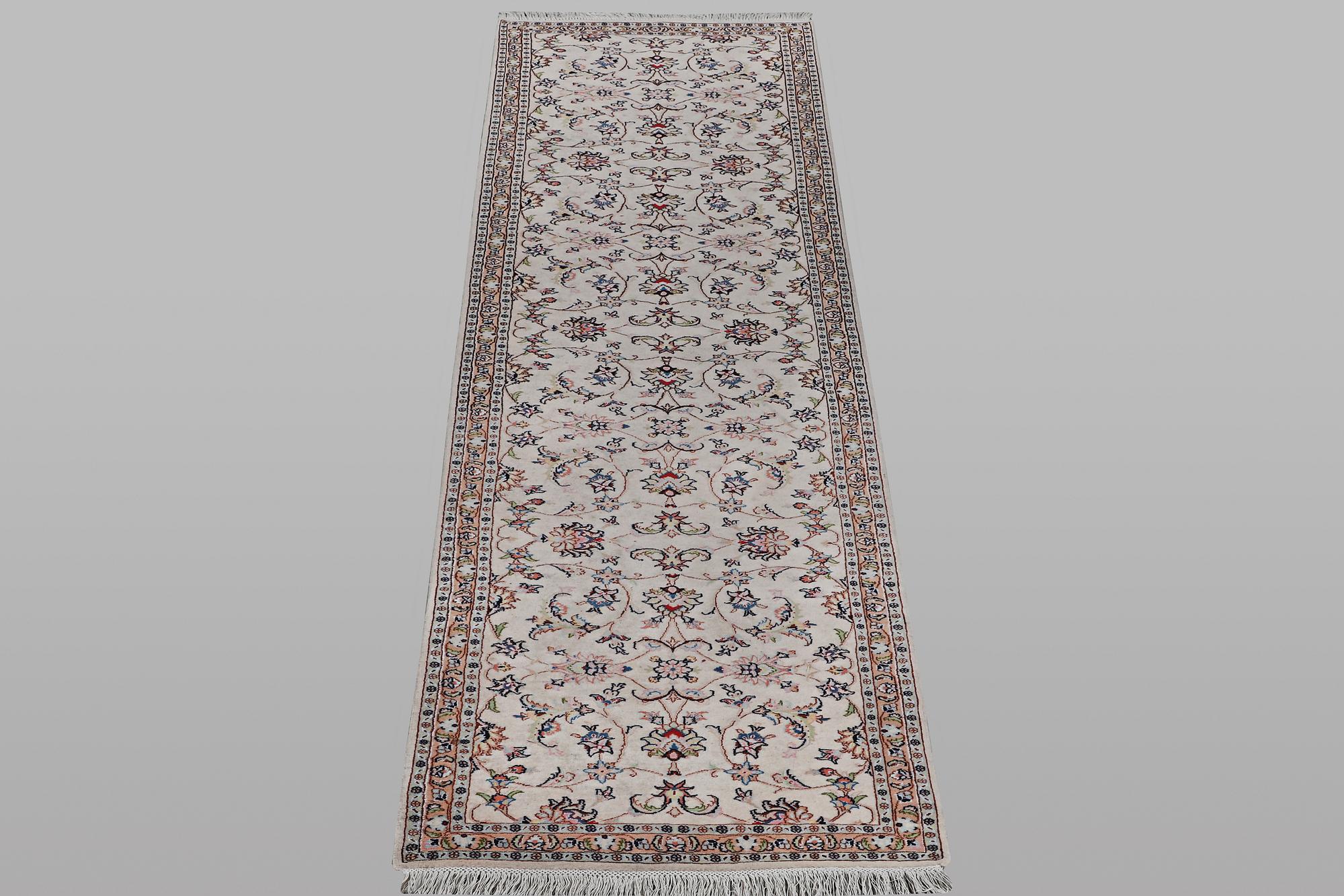 A runner carpet, Kashan, ca 380 x 86 cm.