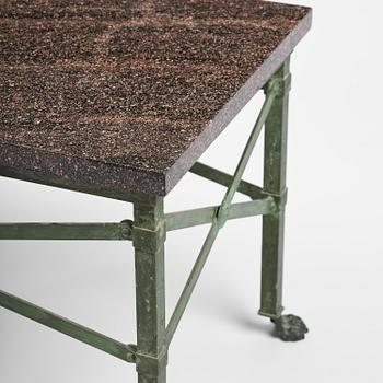 A table with Swedish 'Orrlok' porhyry top, early 19th century on a later bronze stand.