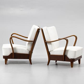 Armchairs, a pair, 1940s/50s.