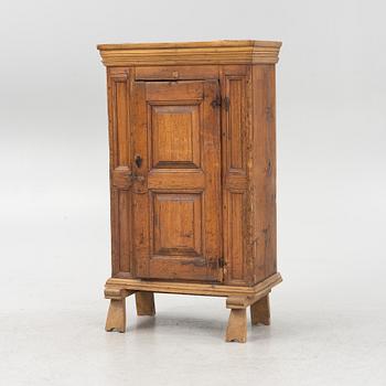 A pinewood cabinet, 18th Century.