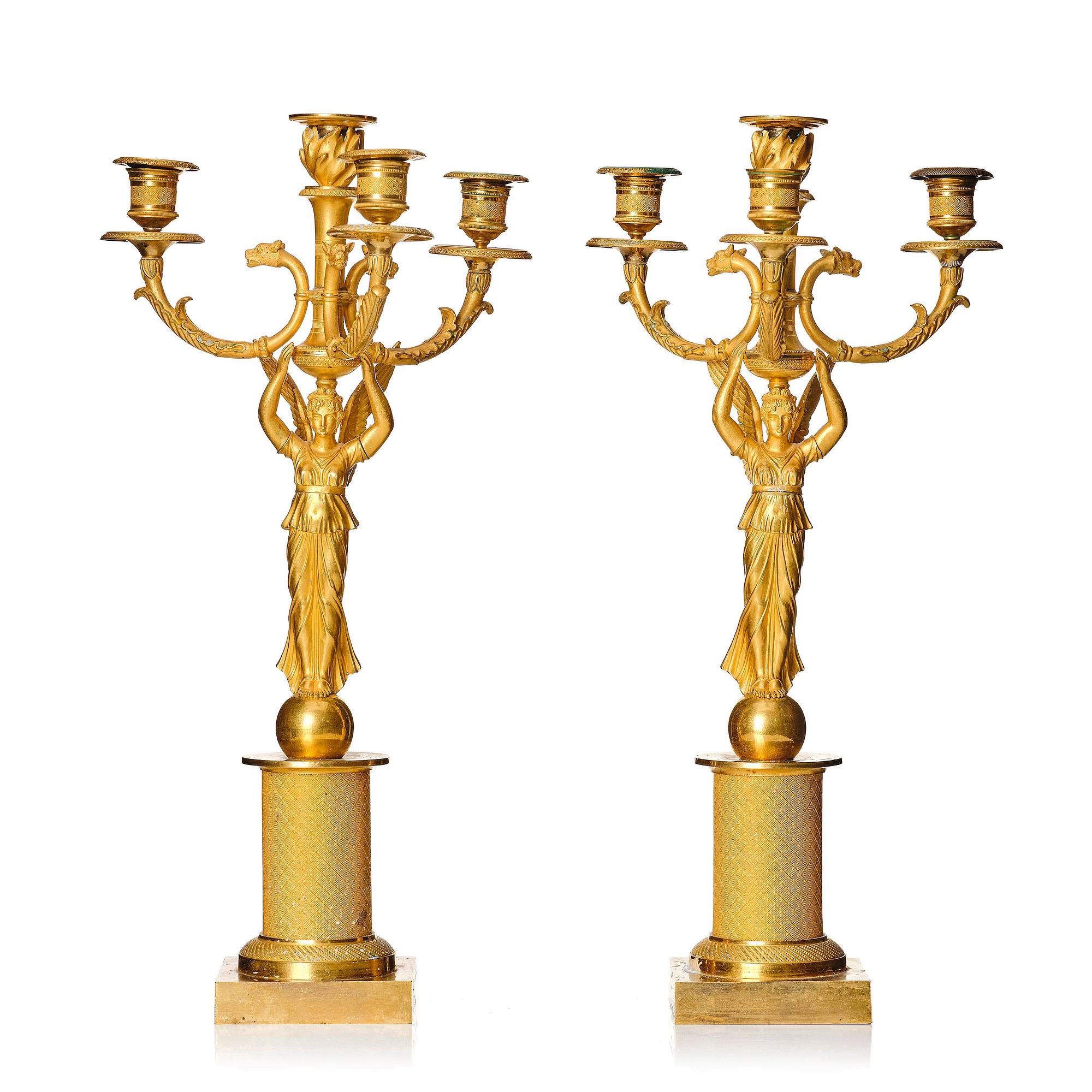 A pair of Empire candelabras for four lights, beginning of the 19th century.