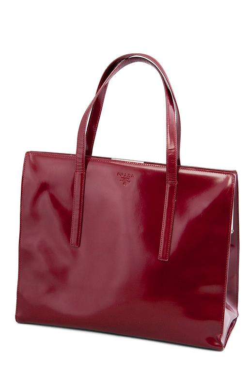 A HANDBAG, Prada.
