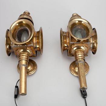 VÄGGLYKTOR, mässing, 1900-tal.