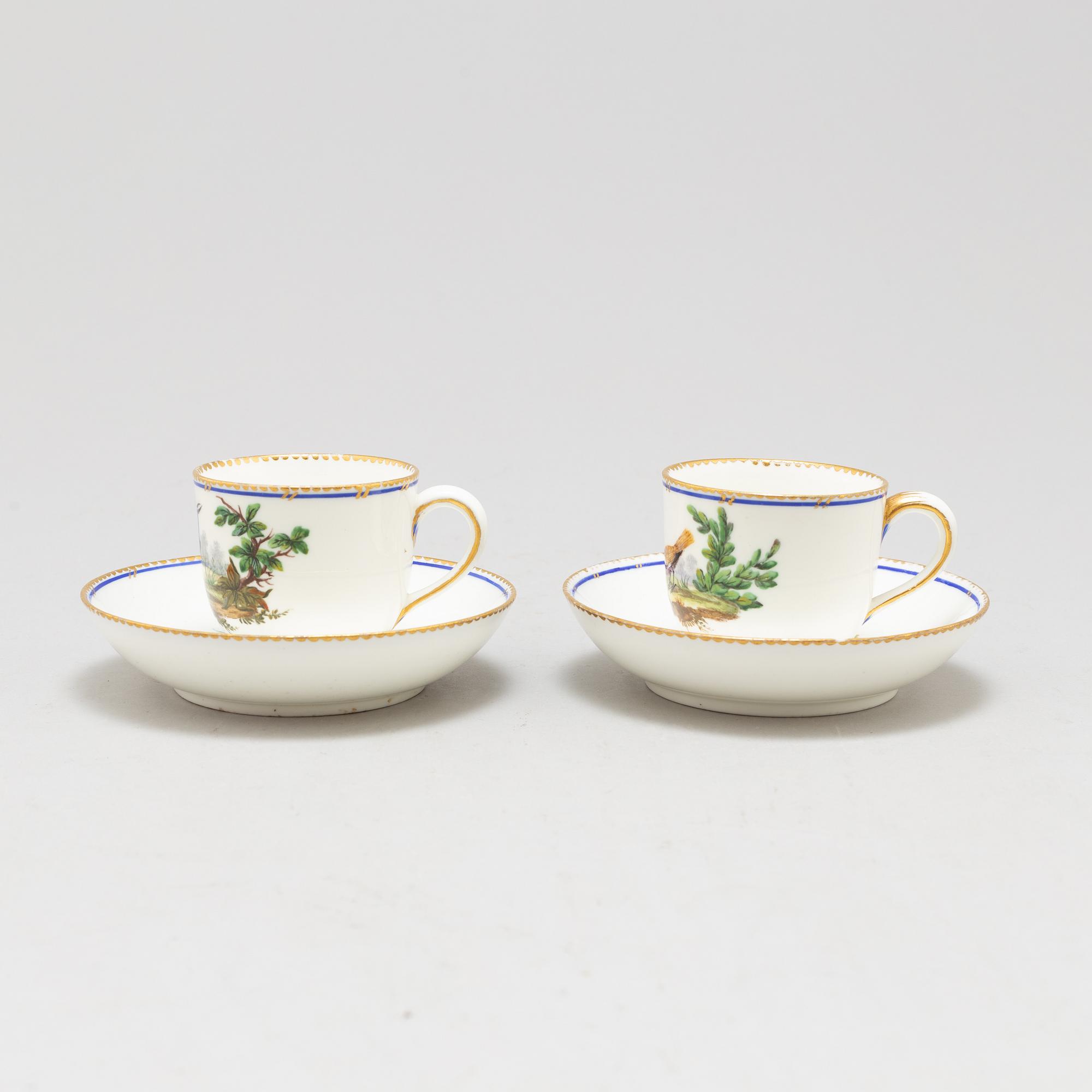 A pair of cups and saucers, "Sévrès"like mark, 19th century.
