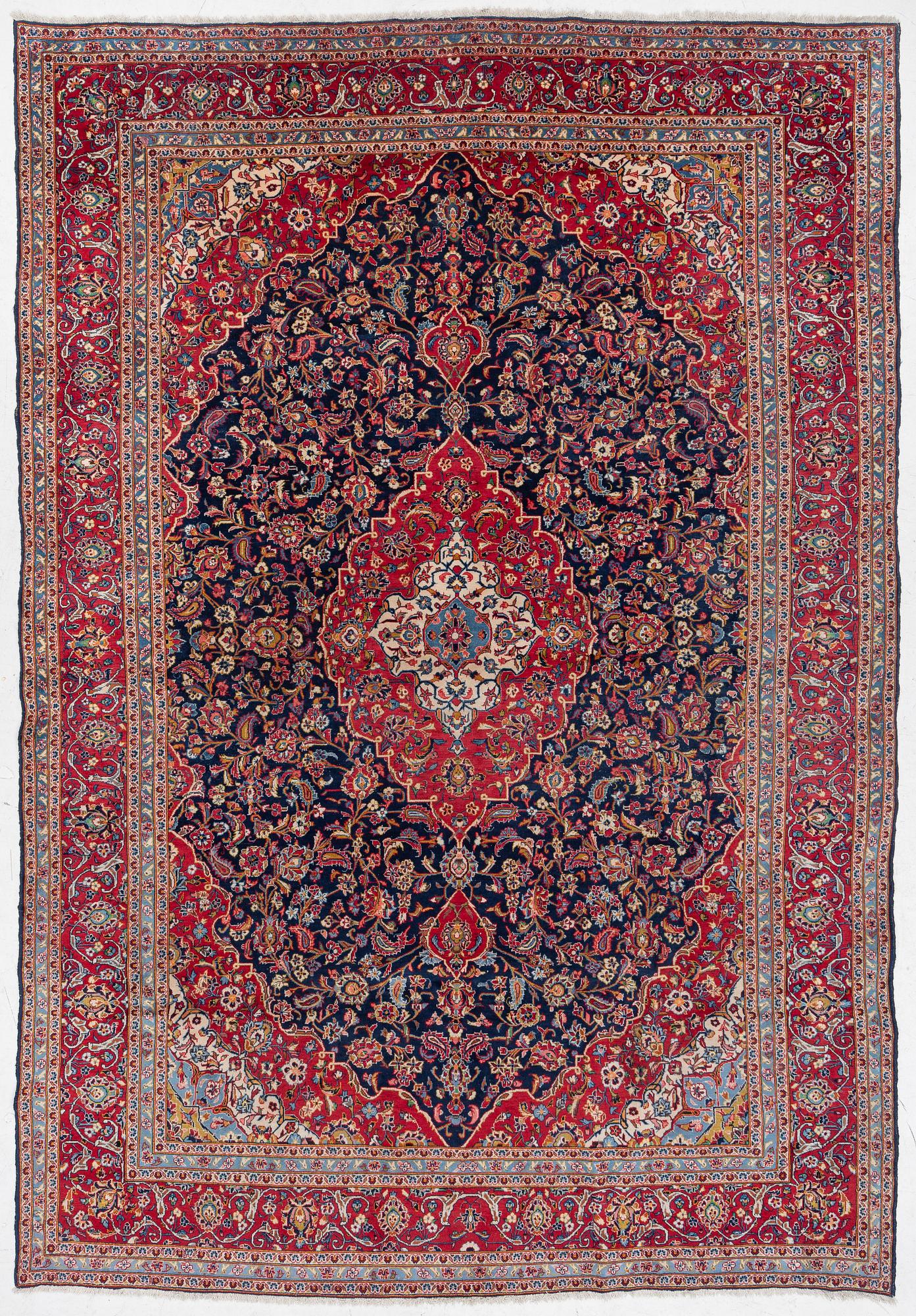 A Kashan carpet, a. 420 x 290 cm.