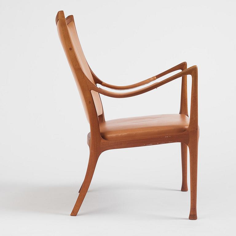 Hans Asplund, a walnut and leather easy chair, Nordiska Kompaniet, ca 1955, for the Nordiska Kompaniet beauty salon.