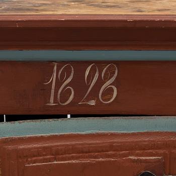 a painted cabinet dated 1828.
