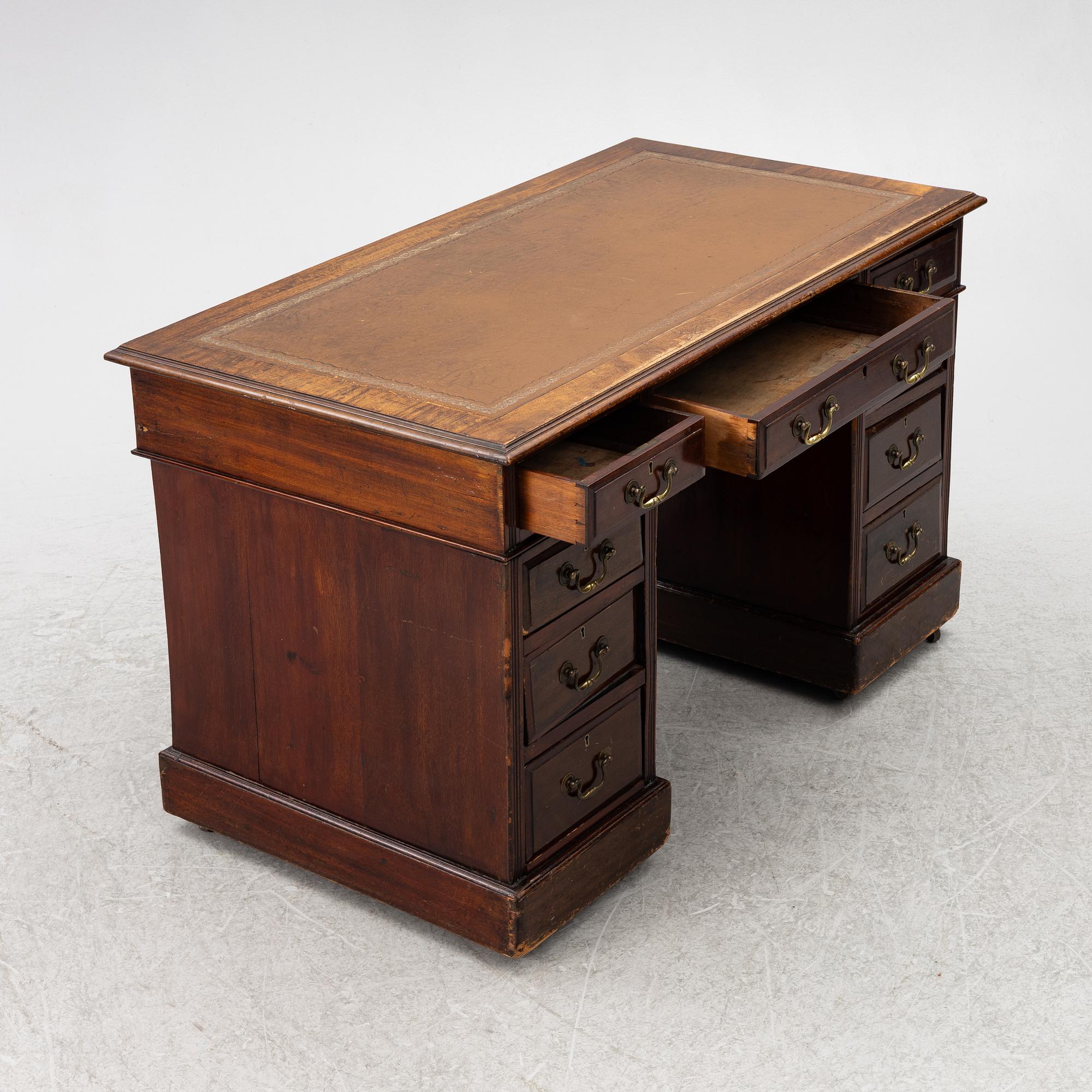 An English style desk, circa 1900.