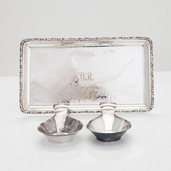 Silver dish by K. Andersson, 1928, and a pair of drinking scoops, maker's mark of C F Carlman, Stockholm 1928 and 1952.