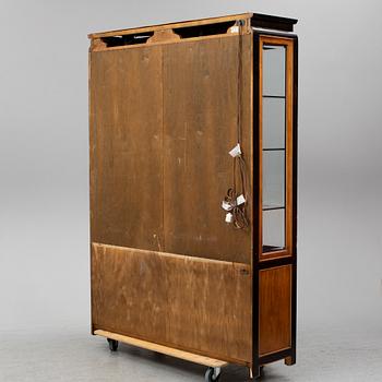 A late 20th century show cabinet.