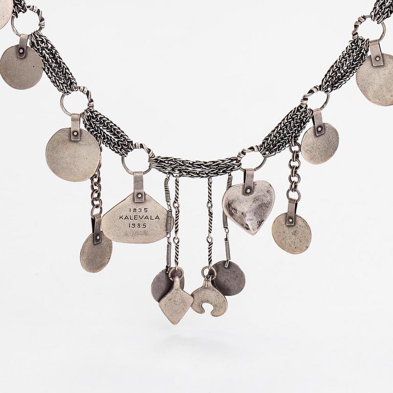 A sterlingsilver jubilee collier for Kalevala's 150th anniversary by Kalevala Koru, Helsinki 1984.