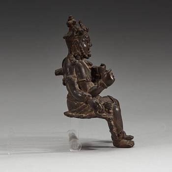 A seated bronze figurine of Mahakala, 15/16th Century or earlier.