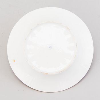 A Popov porcelain cup with saucer, Russia mid-19th Century.