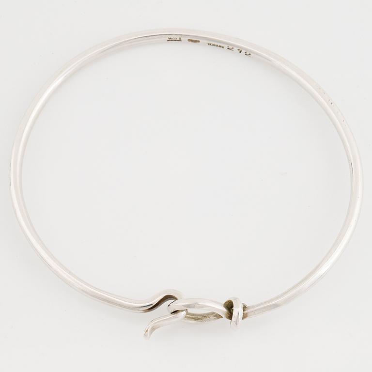 Vivianna Torun Bülow-Hübe, a sterling silver 212 bangle, Georg Jensen, Denmark.