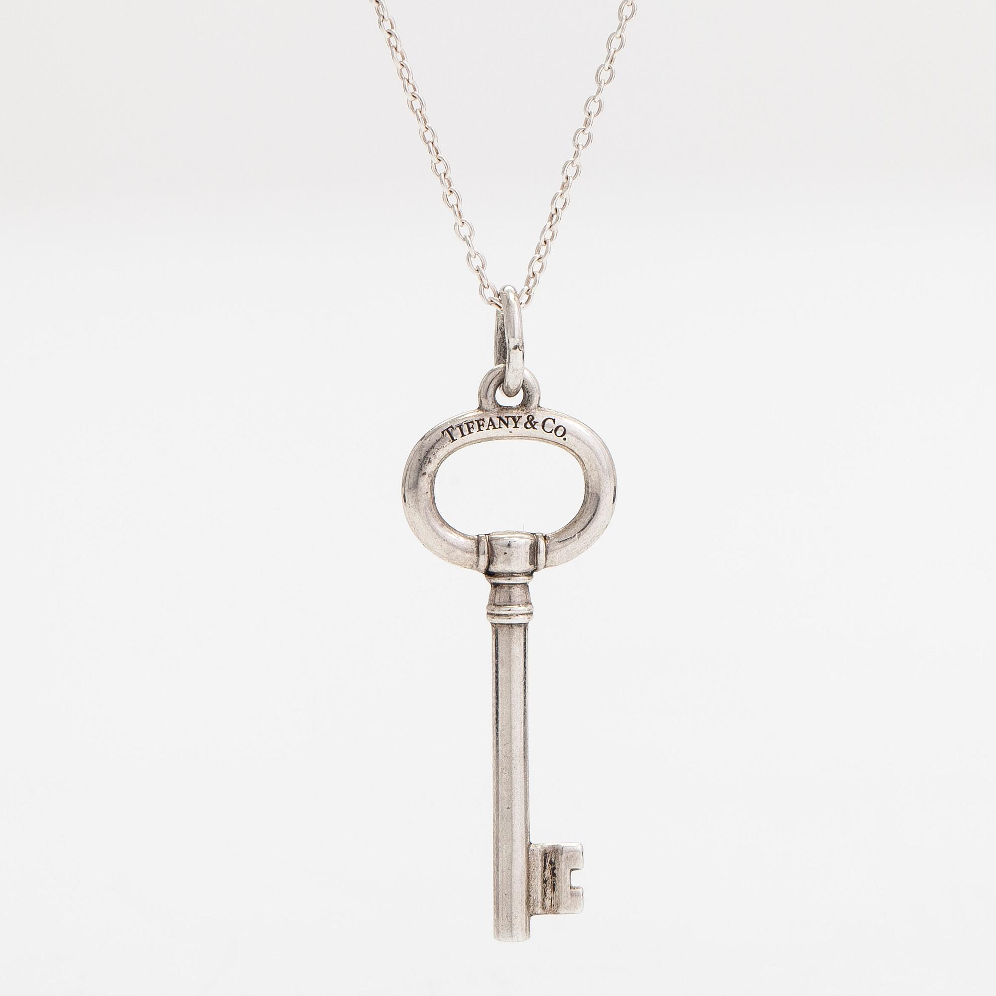 Tiffany & Co, A sterlingsilver pendant with chain.