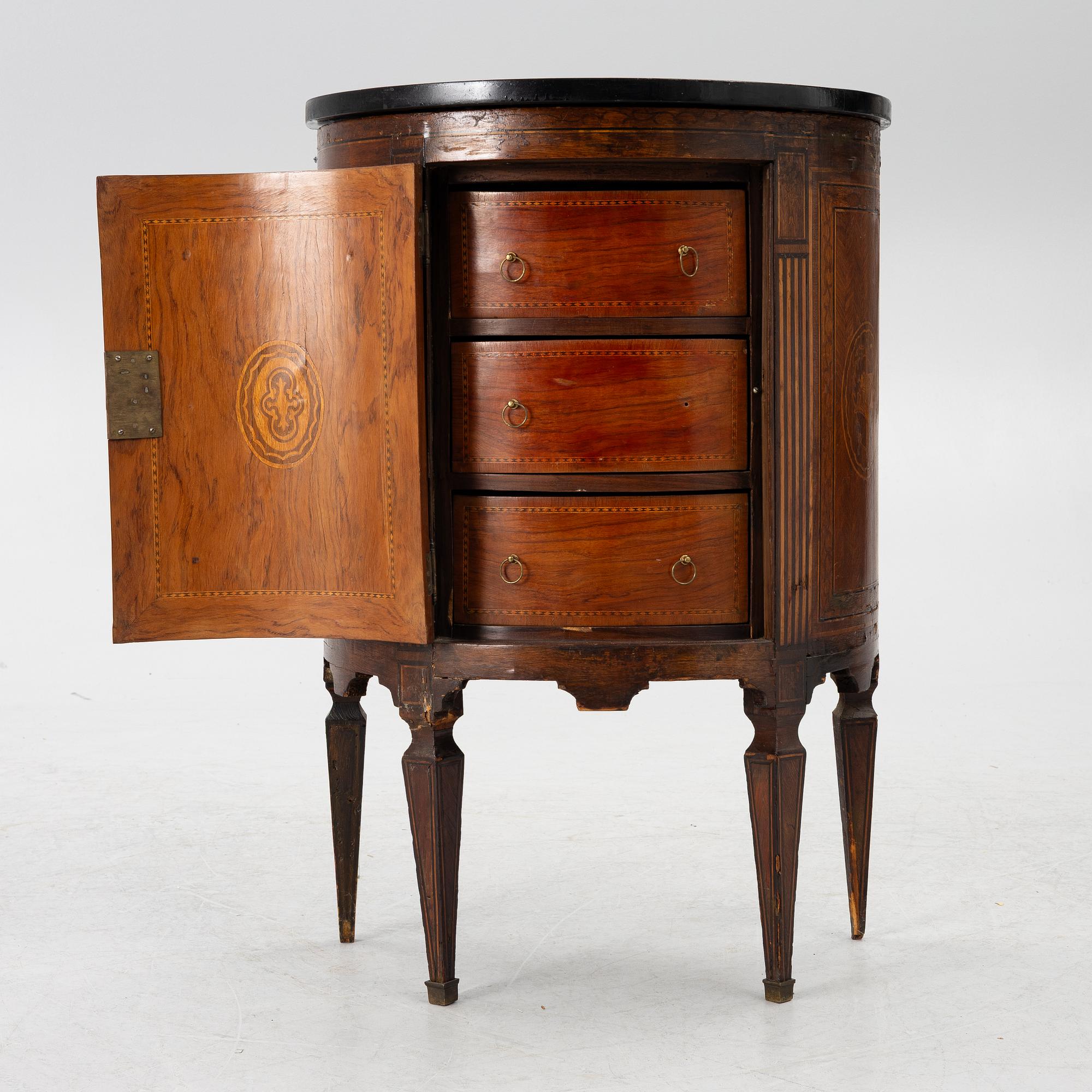 A small cabinet with drawers from around the year 1900.