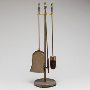 A brass firestand, 20th century.