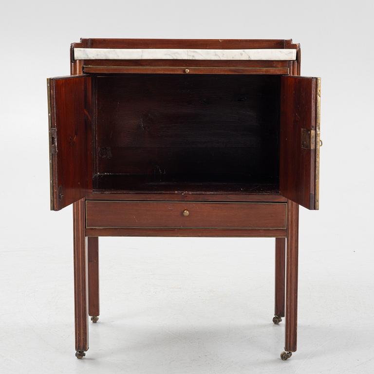 A late Gustavian mahogany chamberpot cupboard, circa 1800.